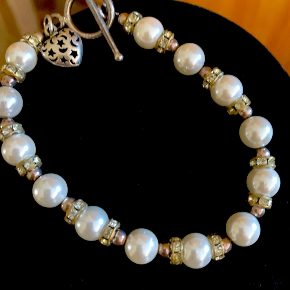 Faux pearl sterling silver bracelet.